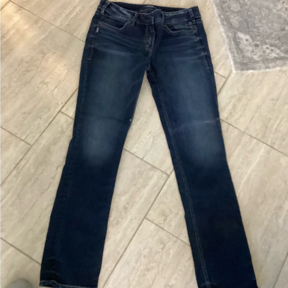 Silver woman’s jeans.